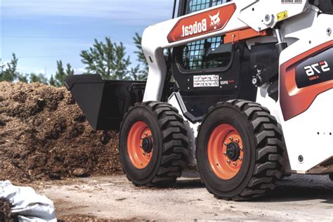 skid steer with just reverse wheels|wheeled skid steer vs tracked.